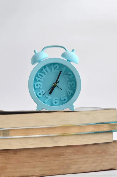 Stack Books Blue Alarm Clock White Background — Stock Photo, Image