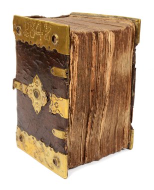 Beyaz arka planda altın süpürge detaylarıyla süslenmiş çok eski bir kitabın fotoğrafı.