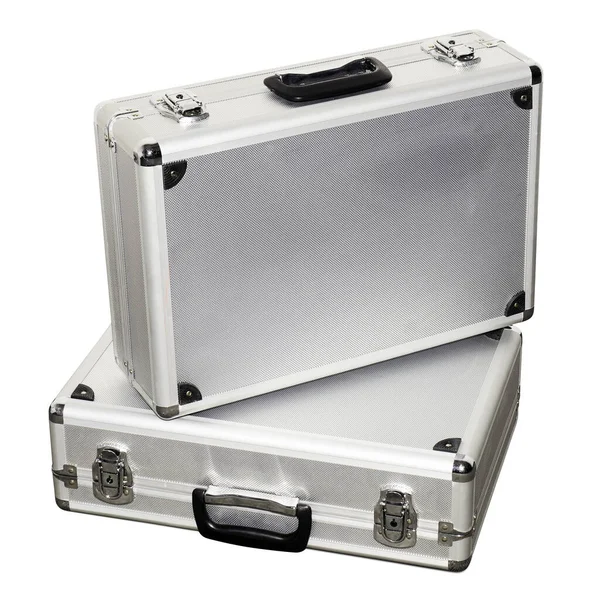 两个铝制行李箱 白色底座上隔离 — 图库照片