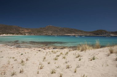 Yunanistan Elafonisos Adası'nda egzotik tunahan Beach kristal berraklığında suları