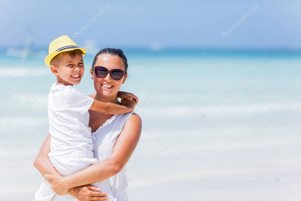Mother with his son at the beach