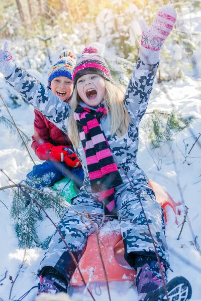Kids playing in big snow in winter. — Stock Photo, Image