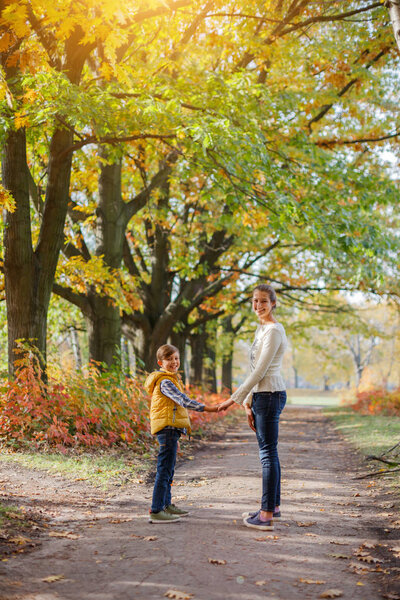 Happy kids having fun in autumn park