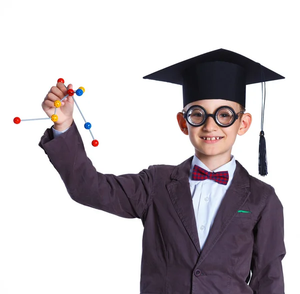 Liten pojke i akademiska hatt — Stockfoto