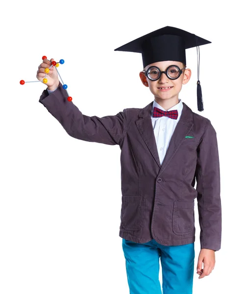 Malý chlapec v akademických klobouku — Stock fotografie