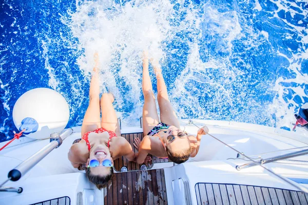 Two Beautiful Girls relaxing On Yacht in Greece — Stock Photo, Image