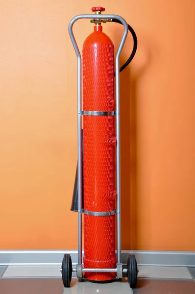 Red fire extinguisher — Stock Photo, Image