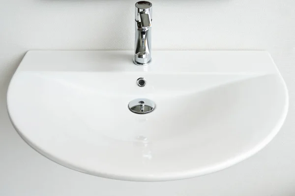 Modern bathroom sink and tap Royalty Free Stock Photos