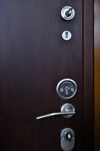 Wood Looking Front Door Internal Stainless Steel Keyholes — Stock Photo, Image