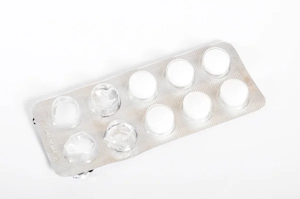 Comprimidos brancos embalados — Fotografia de Stock