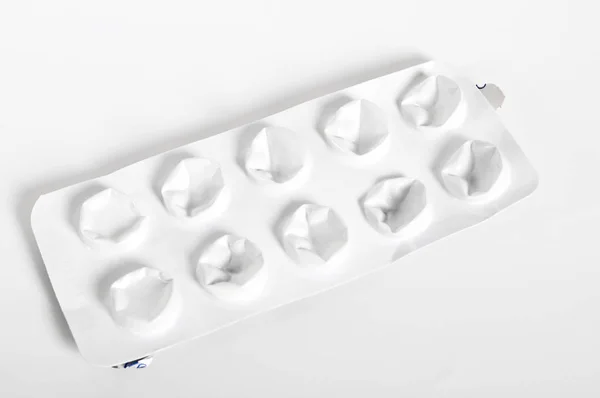 Συσκευασμένα λευκό χάπια — Φωτογραφία Αρχείου