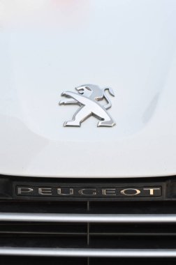 Close up Peugeot logo. Chrome metal. June 2017 clipart