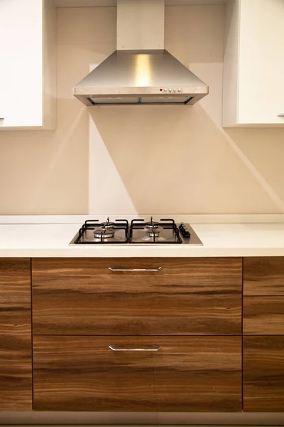 Interior of luxurious modern kitchen and walnut white cabinets — Stock Photo, Image