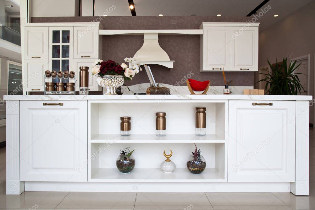 Interior of luxurious modern kitchen white cabinets