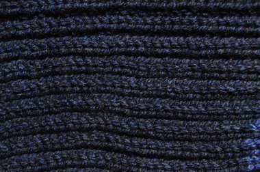 El yapımı örgü kumaş koyu mavi yün arkaplan dokusu