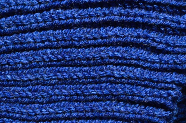 Текстура в'язаної тканини з синьої вовни ручної роботи — стокове фото