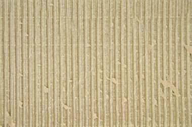 Kahverengi ve bej renkli kıvrımlı karton detaylar