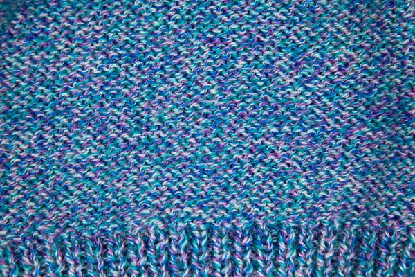 Handgemaakte gebreide stof blauwe wol achtergrond textuur — Stockfoto