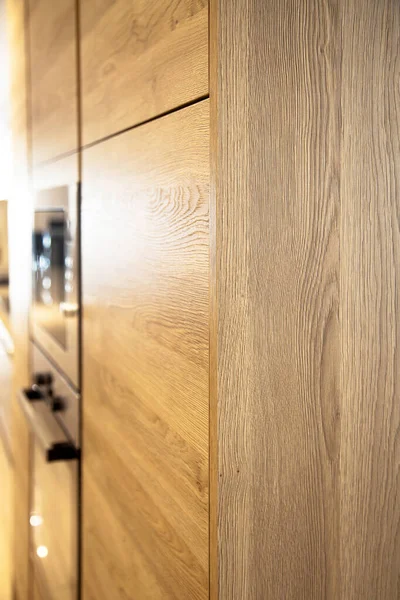 Interior of modern kitchen, oak cabinets corner — Stock Photo, Image
