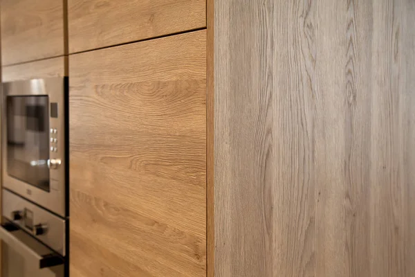 Interior of modern kitchen, oak cabinets corner — Stock Photo, Image