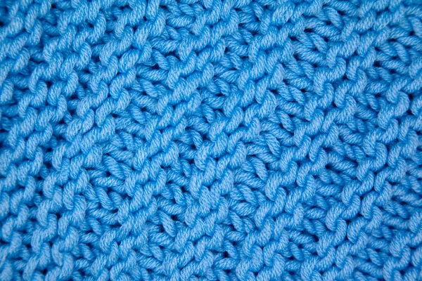 Tecido de malha artesanal lã azul textura de fundo — Fotografia de Stock