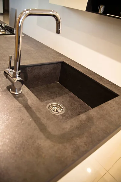 Interior of modern kitchen and ceramic sink and tap — Stock Photo, Image