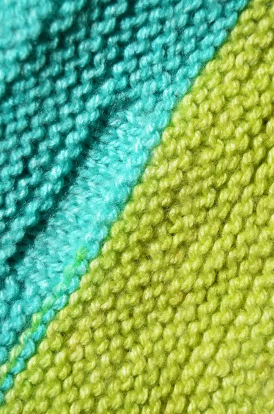 Handmade knitted fabric turquoise and green wool background text — Stockfoto