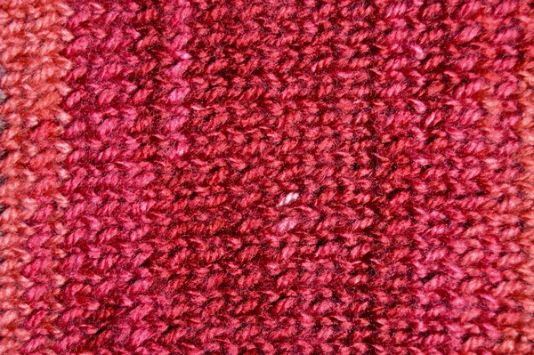 Handmade knitted fabric red wool background texture — Stock Photo, Image