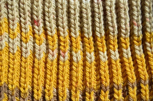 Handmade knitted fabric yellow wool background texture — Stock Photo, Image