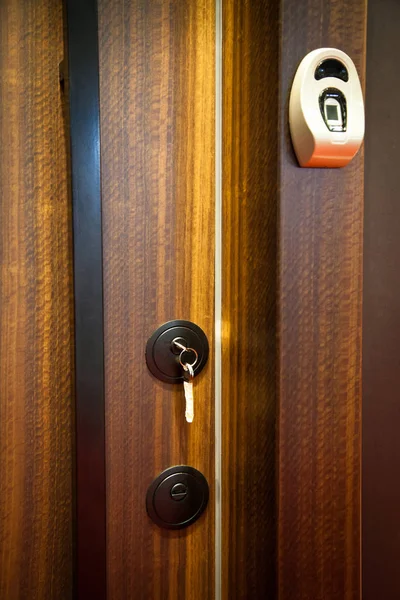 Modern wooden looking steel door, security electronic lock syste — Stock Photo, Image