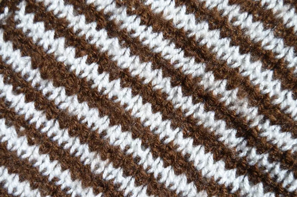 Handmade knitted fabric brown white wool background texture — 스톡 사진