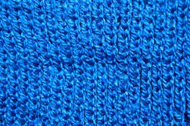 Yünden desenli kumaş. El yapımı kumaş mavi yün arkaplan dokusu