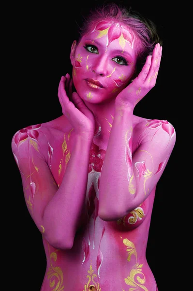 Woman in paint. Attractive and sexy girl body art