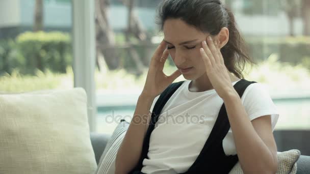 Young woman with headache, close up — Stock Video