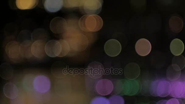 Bokeh Fontaine d'eau colorée la nuit 