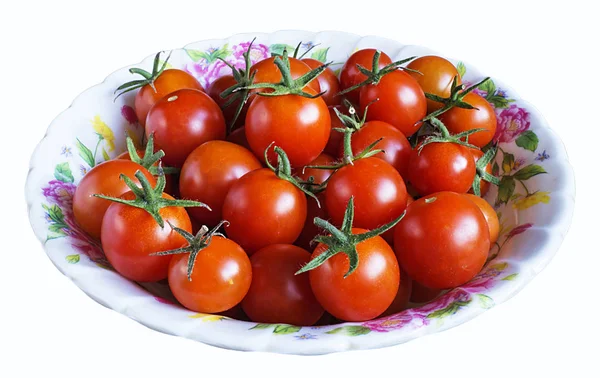Red tomato in plate — Stock Photo, Image