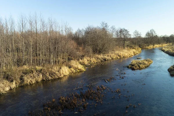 Autumn landscape with river on background blue sky — Stock Photo, Image