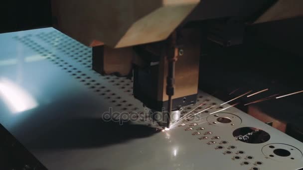 Plasma laser cutting metal sheet with sparks. Close-up — Stock Video