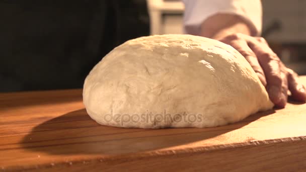 Man chef kneads the dough. Slow mo. Close-up — Stock Video