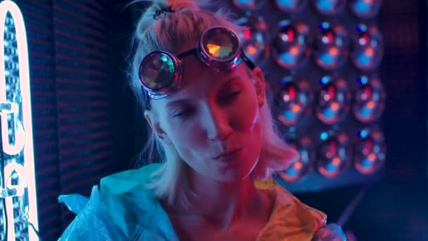 Portrait Young Sexy Playful 30s Funny Woman Blowing Bubble Gum Pink Blue Light — Stock Footage Portrait Young Sexy Playful 30s Funny Woman Blowing Bubble Gum Pink Blue Light — Stock Video