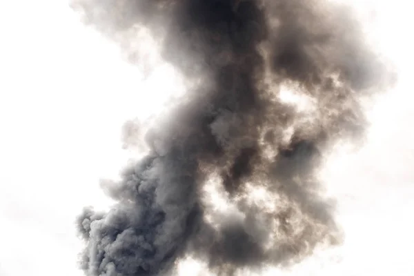 Dense and dark smoke from a fire — Stock Photo, Image