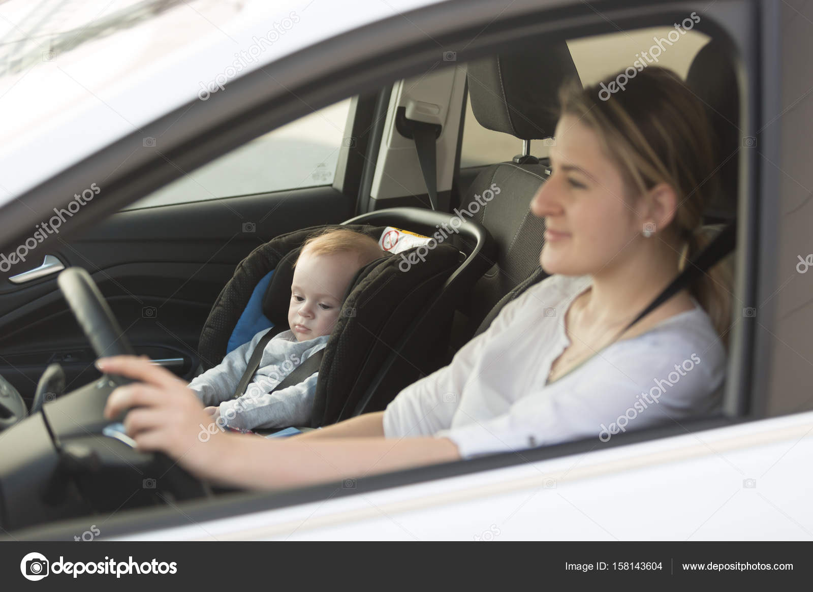 little boy car driving