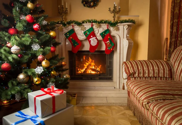 Interior image of living room with burning fireplace, decorated — Stock Photo, Image