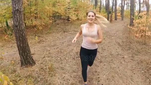 Closeup Slow Motion Shot of Woman in Leggings Running at Forest