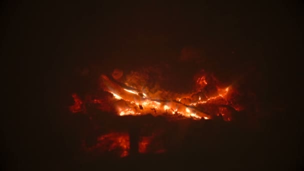 Closeup of beautiful glowing embers at fireplace — Stock Video