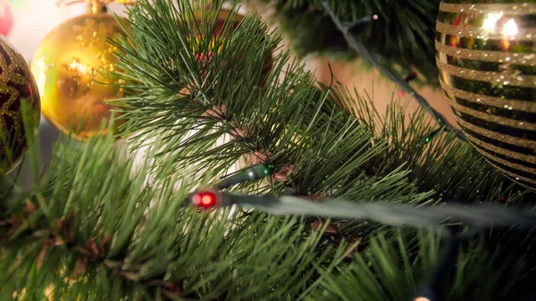 Closeup image of branches on decorated Christmas tree — Stock Photo, Image
