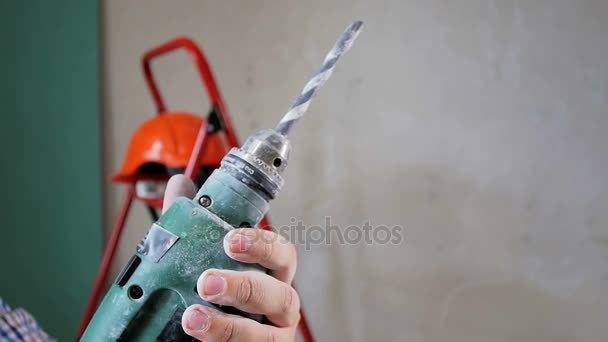 Closeup slow motion footage of rotating electric drill — Stock Video