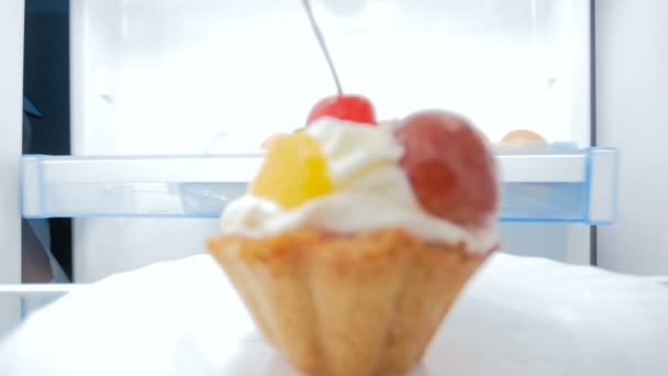 4k footage of young family taking last piece of cake from refrigerator at night — Stock Video