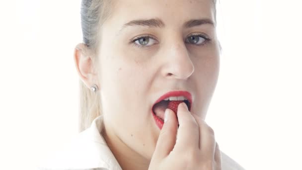 4k closeup video of sexy seductive woman eating fresh raspberry — Stock Video