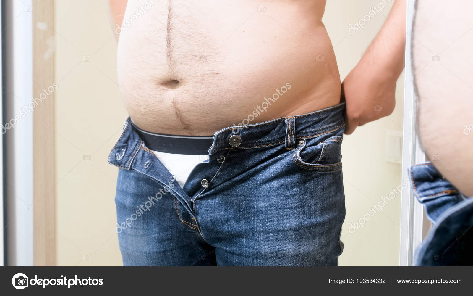 fat man in jeans